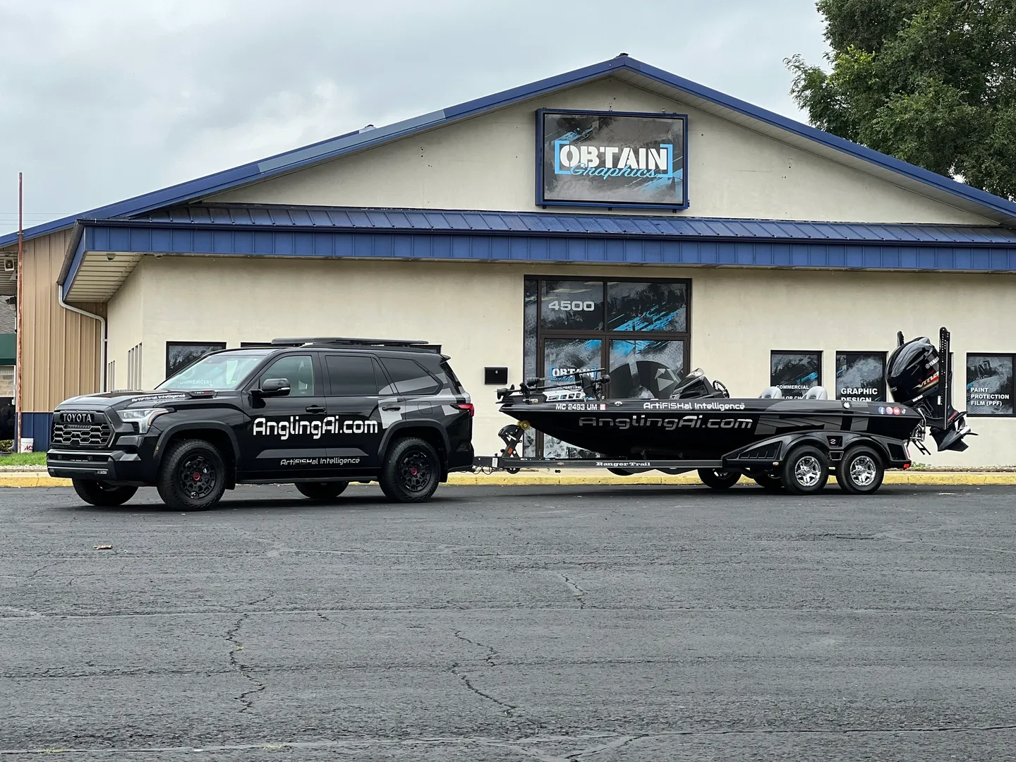 A boat is parked in front of the store.